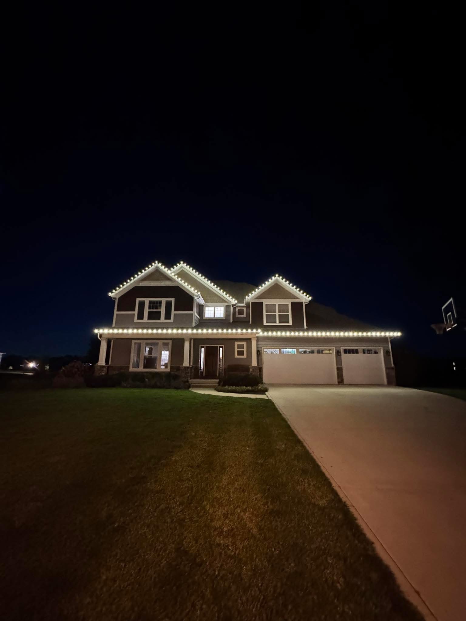 Exterior holiday lighting installation 11