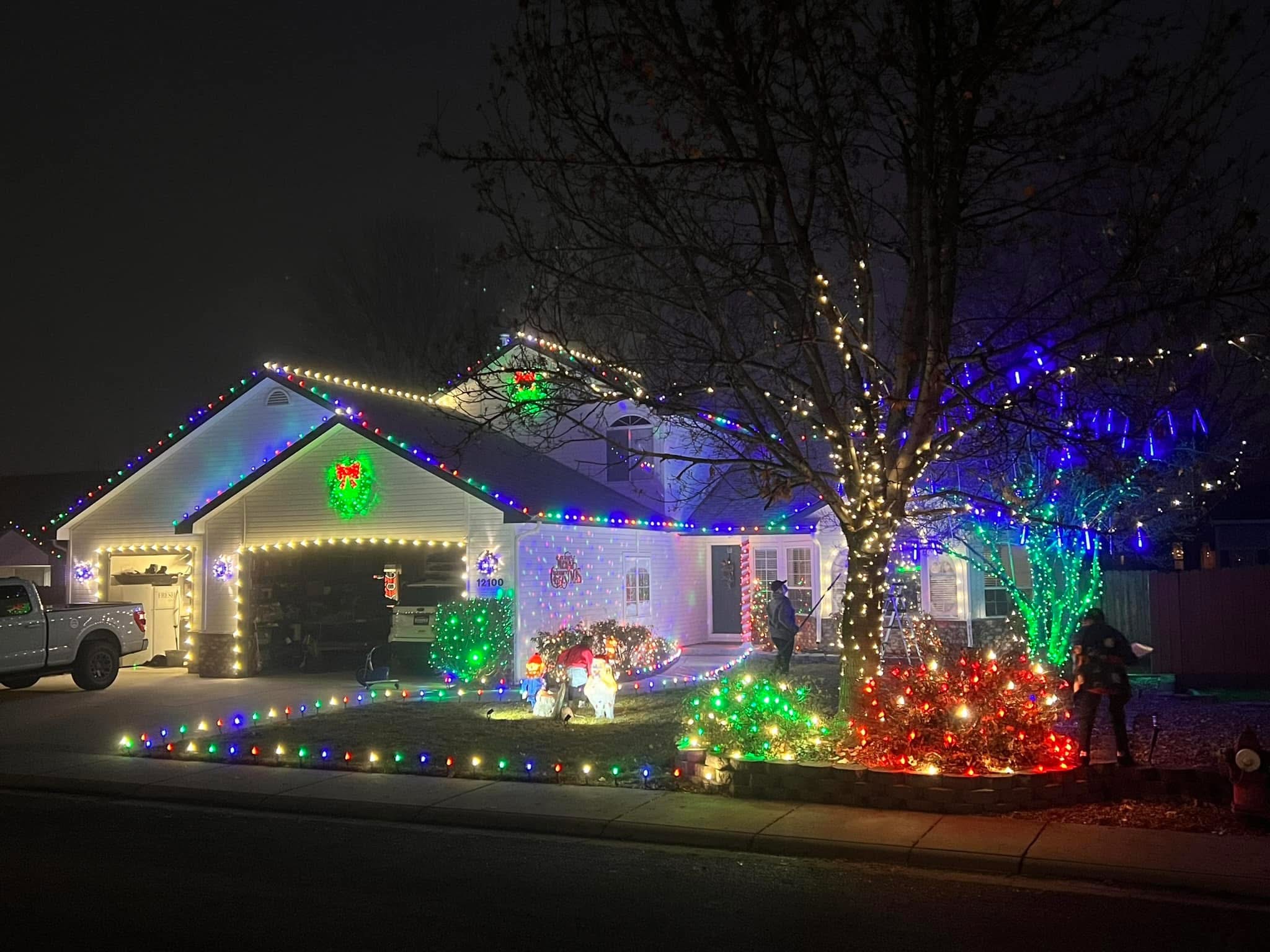 Exterior holiday lighting installation 12