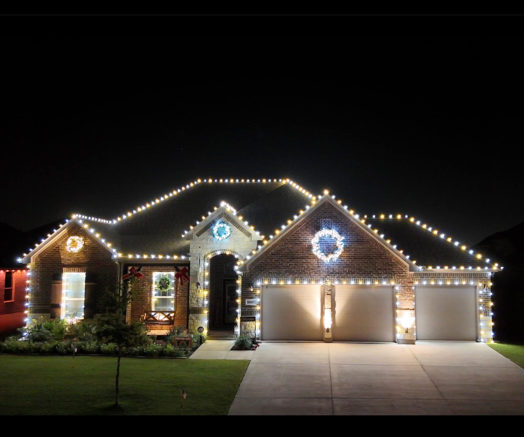 Exterior holiday lighting installation 14