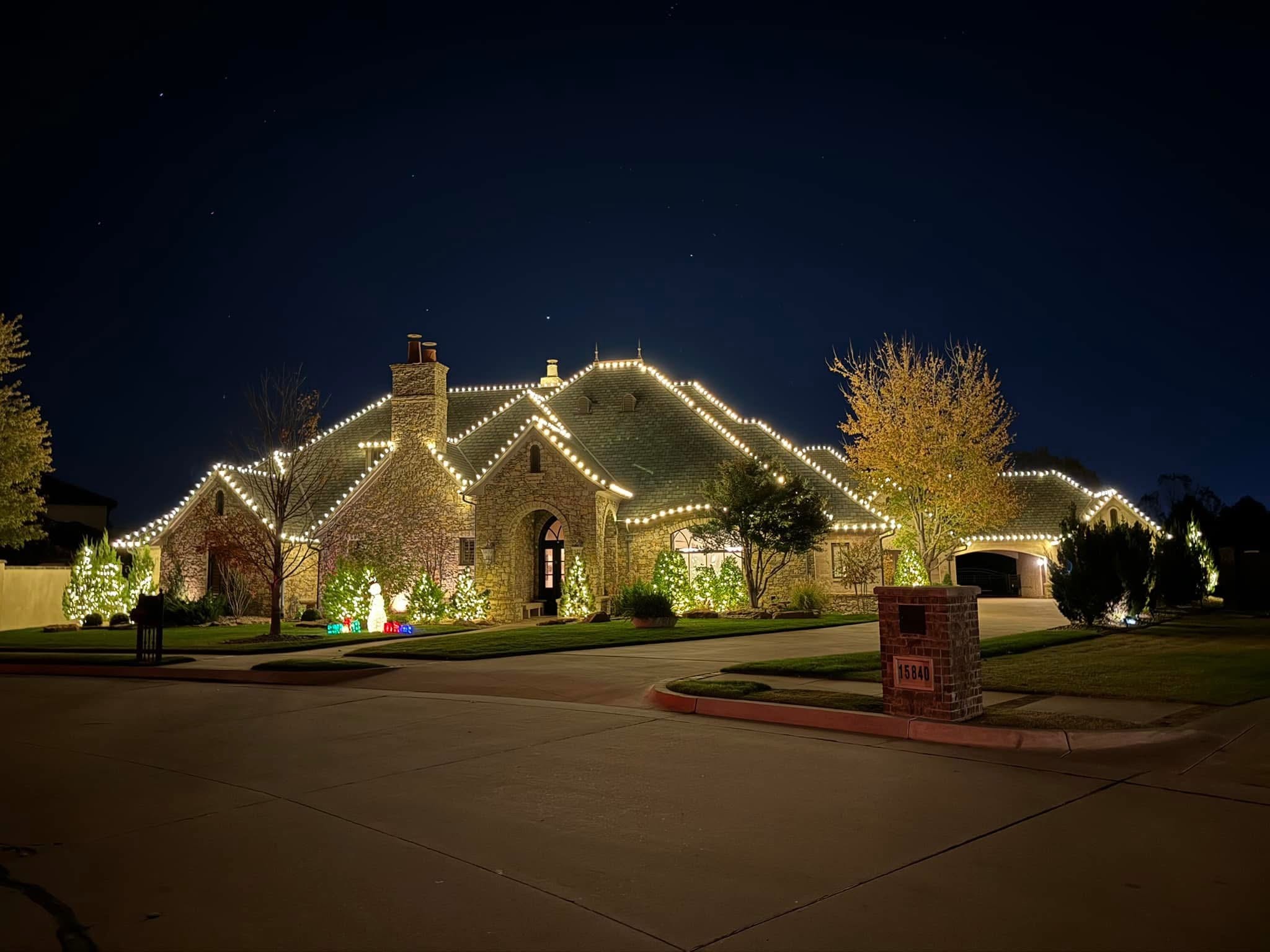 Exterior holiday lighting installation 15