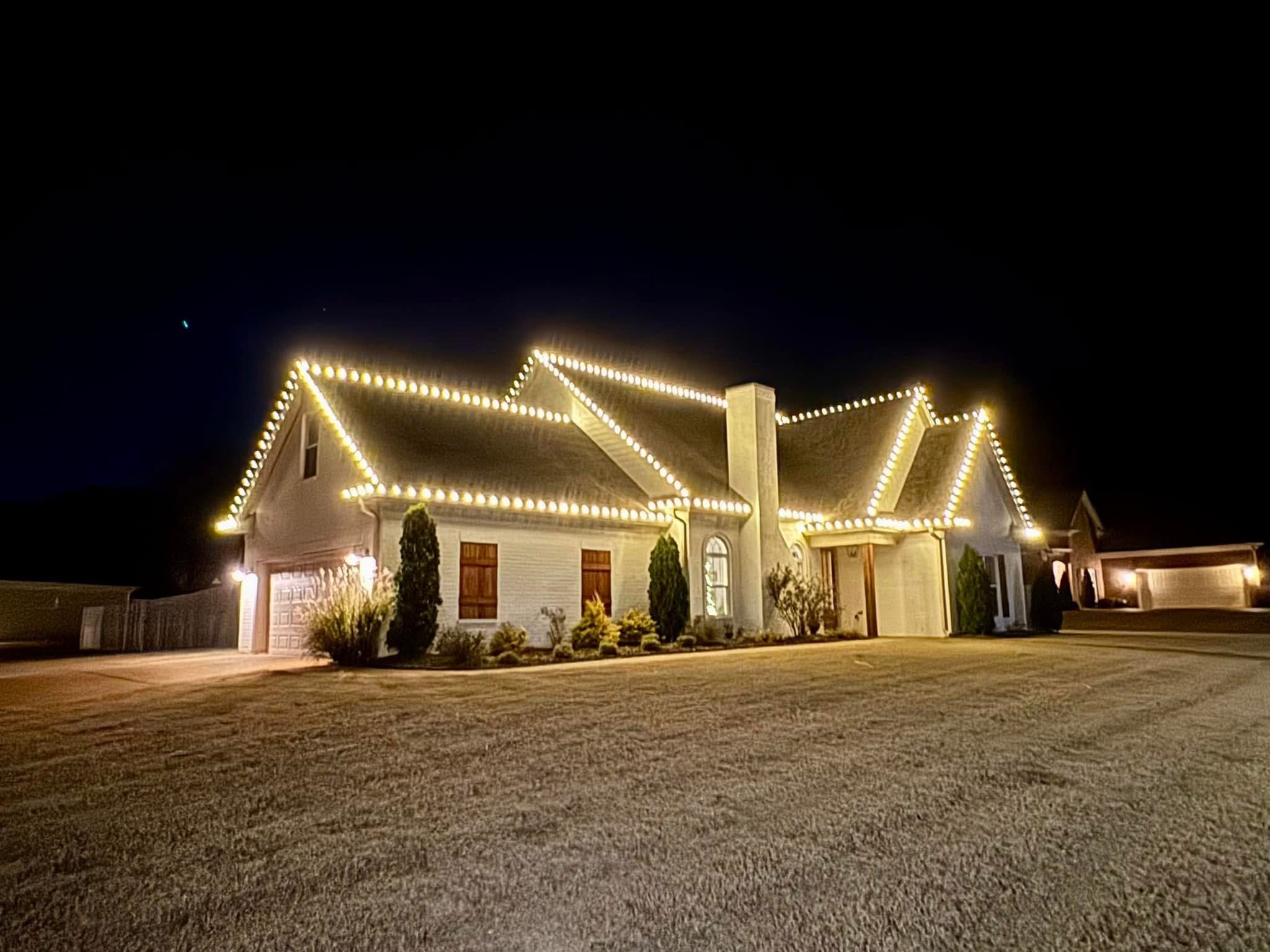 Exterior holiday lighting installation 16