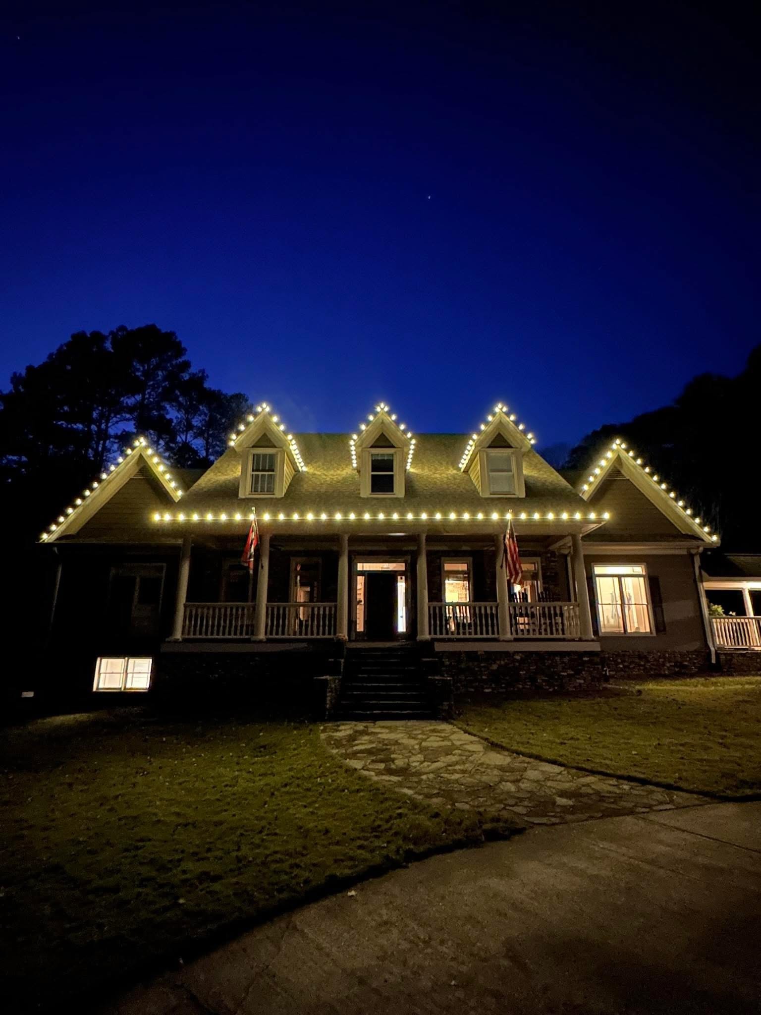 Exterior holiday lighting installation 17