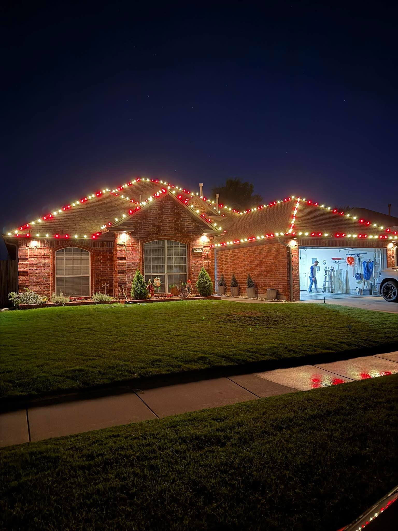 Exterior holiday lighting installation 18