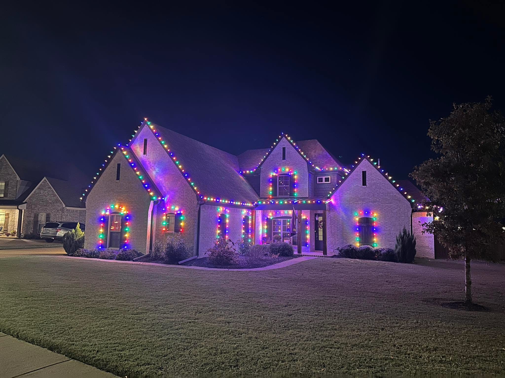 Exterior holiday lighting installation 19