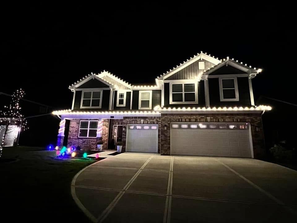 Exterior holiday lighting installation 23