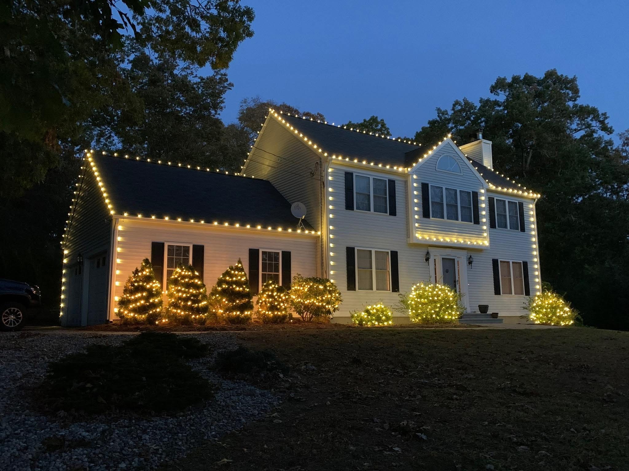Exterior holiday lighting installation 24
