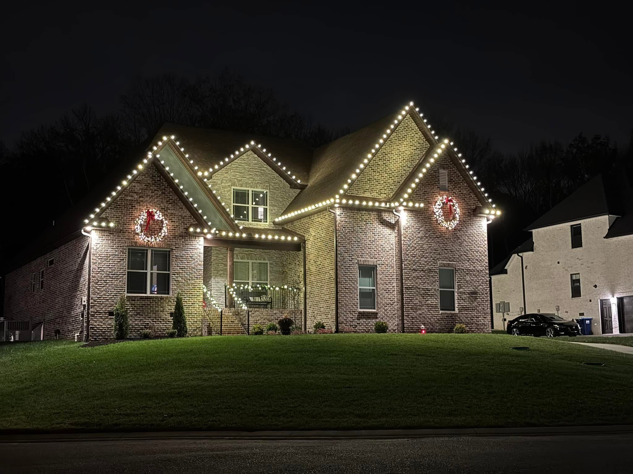 Exterior holiday lighting installation 25