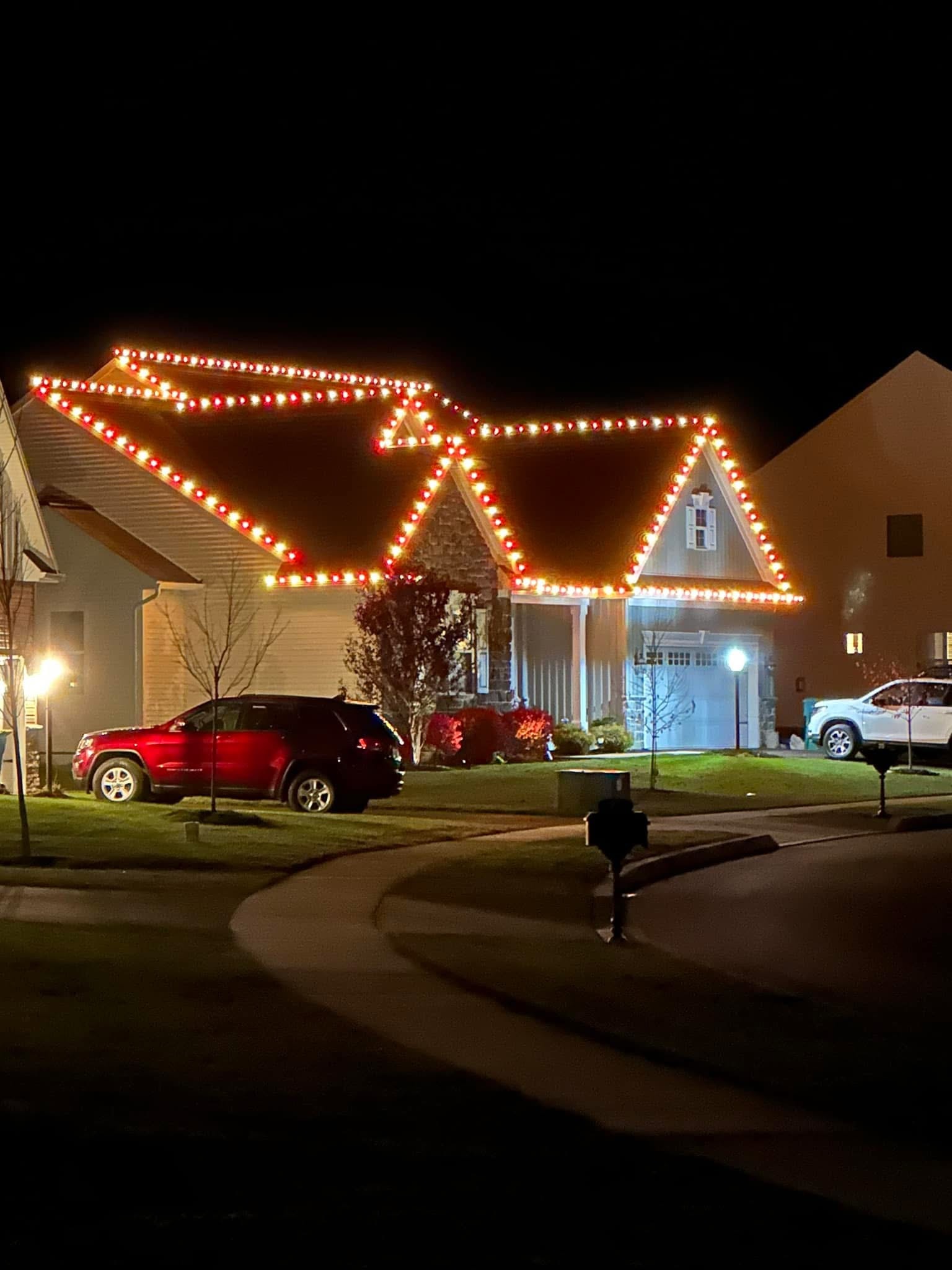 Exterior holiday lighting installation 27