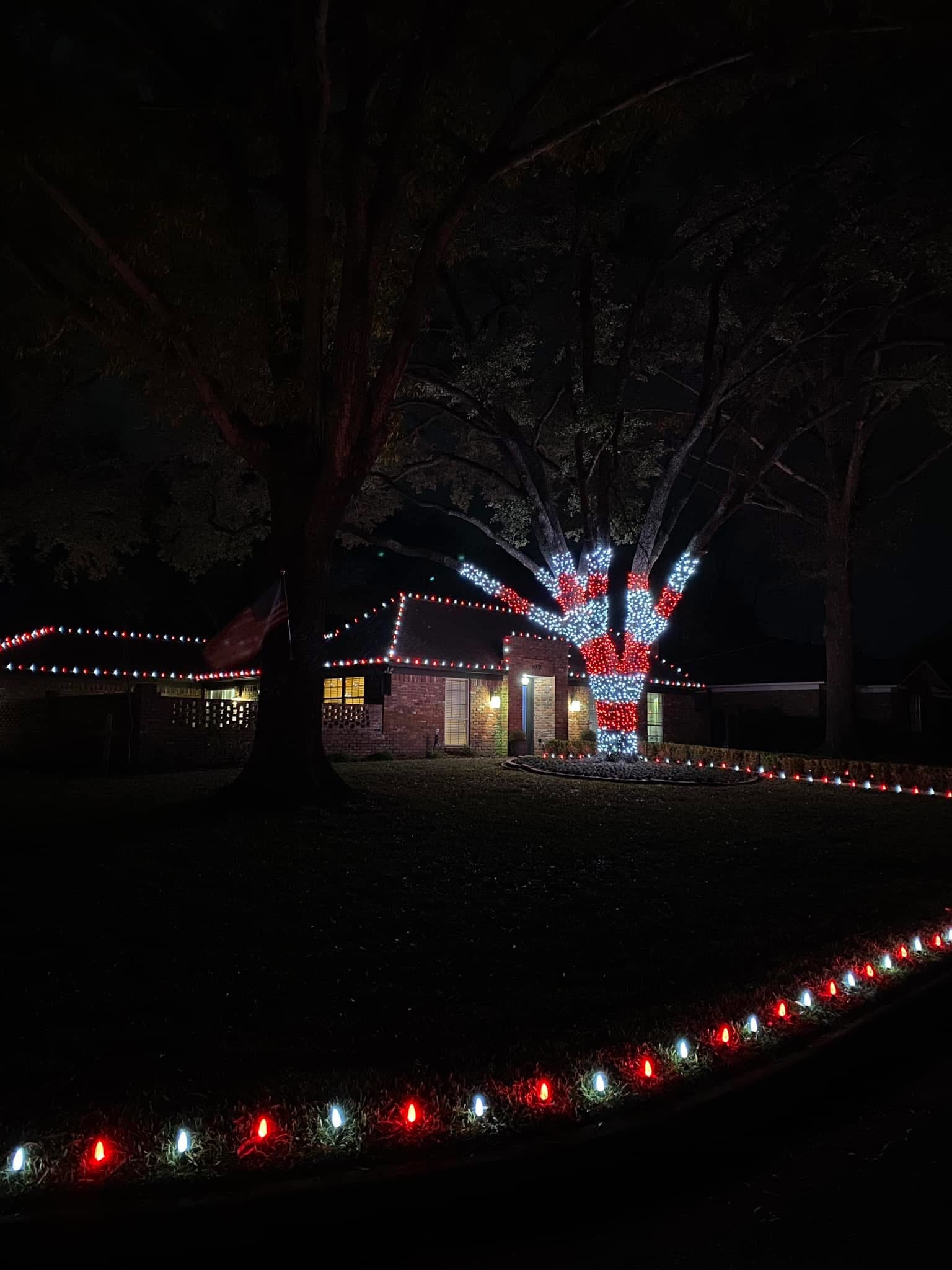 Exterior holiday lighting installation 28