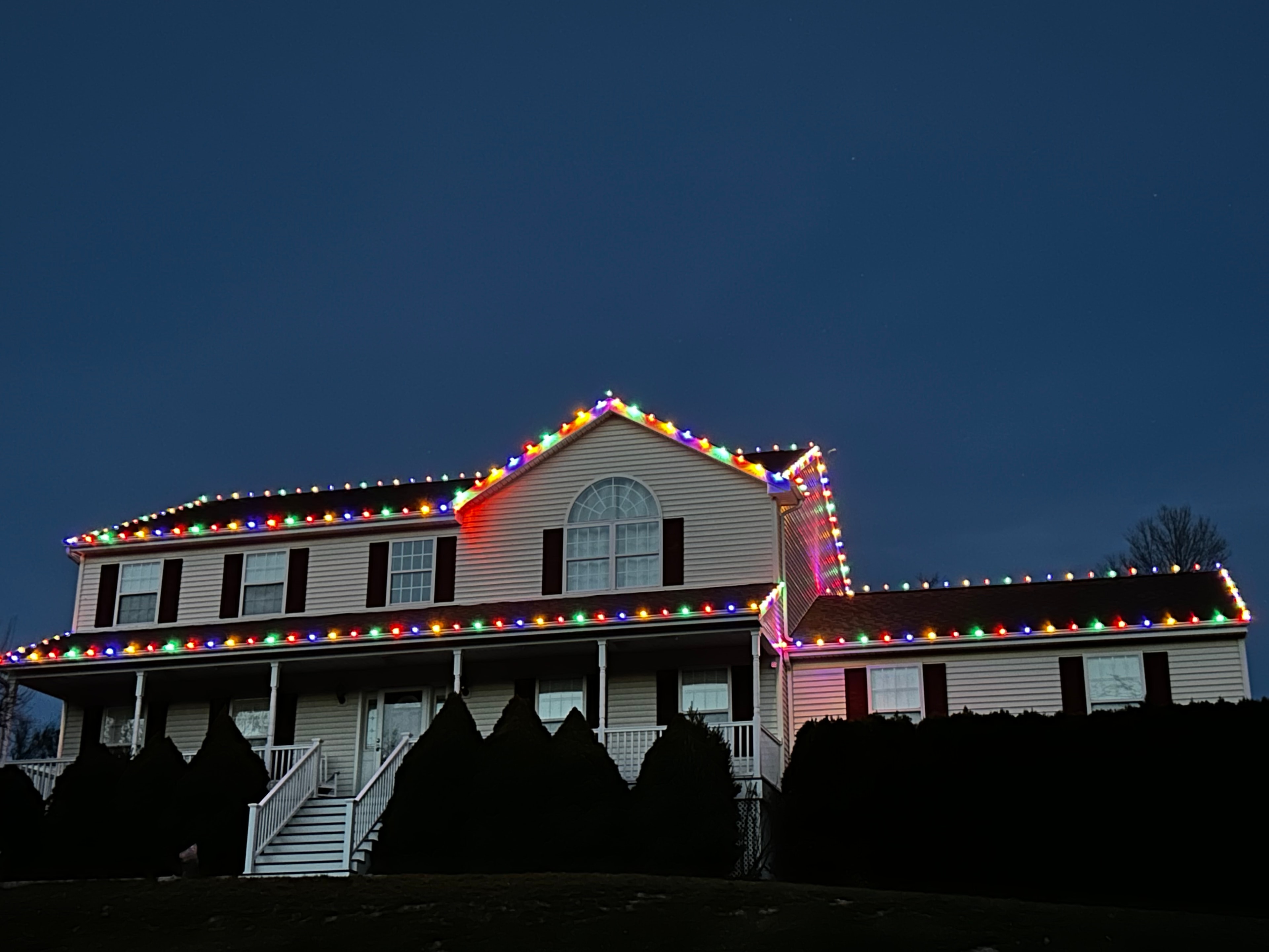 Exterior holiday lighting installation 8
